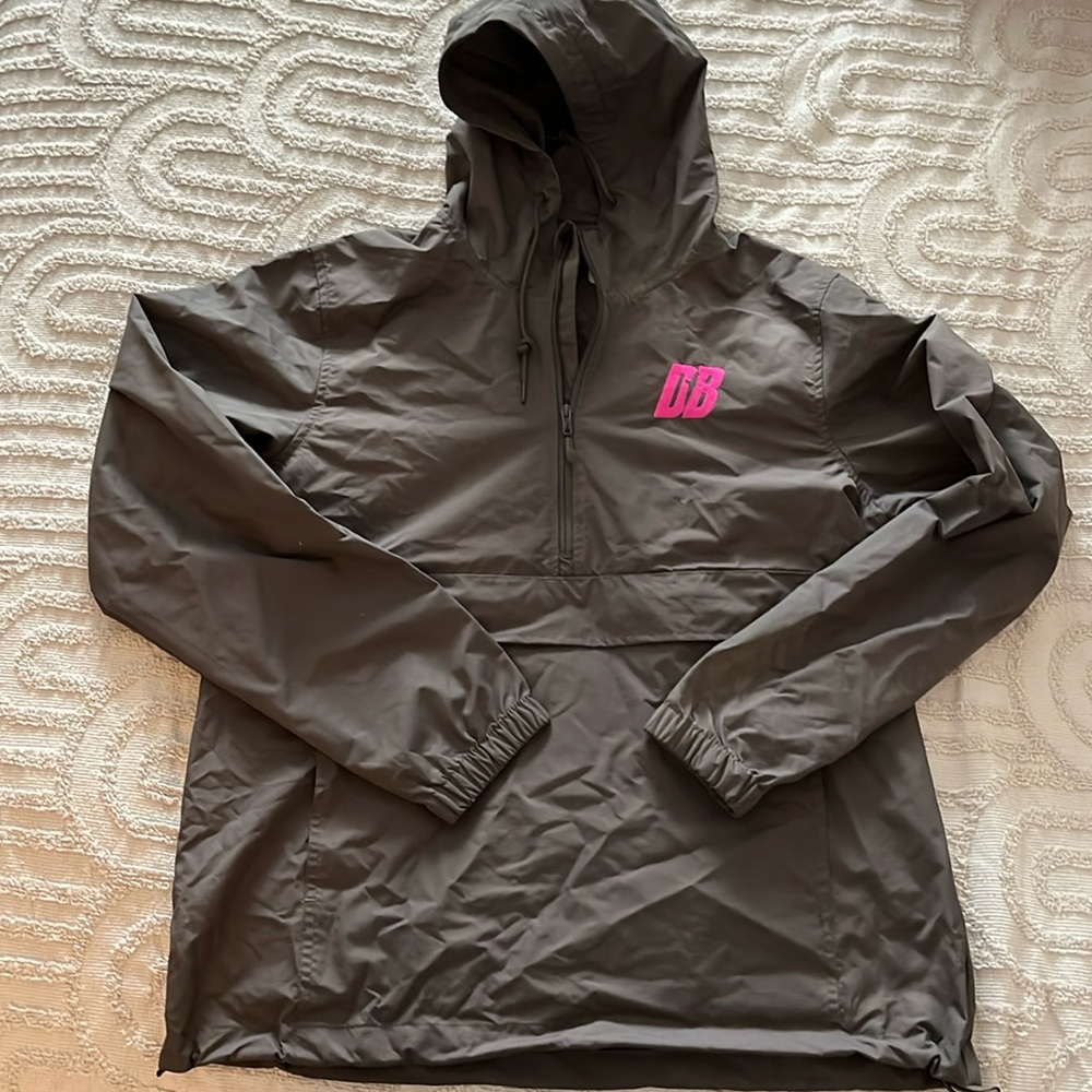 “Loud and proud” women’s 1/4 zip, hooded, light weight windbreaker, size large.
